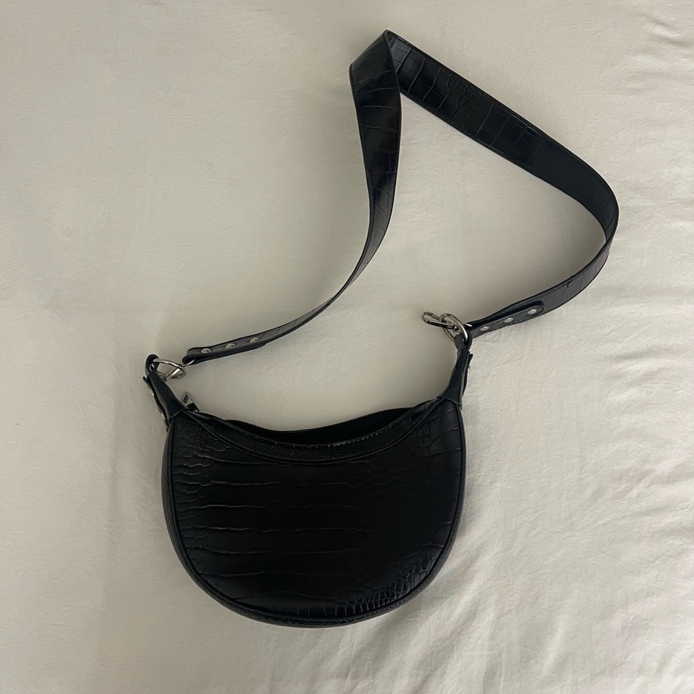 Black textured bag with silver detail
